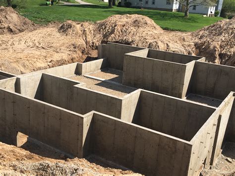 Poured concrete walls - SOLID POURED WALL AND FOUNDATION BENEFITS Comparable cost to reinforced block filled with concrete.Superior strength to block or concrete filled block. Poured walls have no joints.Work with 1 contractor instead of 5 separate subcontractors.No waste, mini Anderson Poured Walls, Inc. 250 Rockwell Drive ...